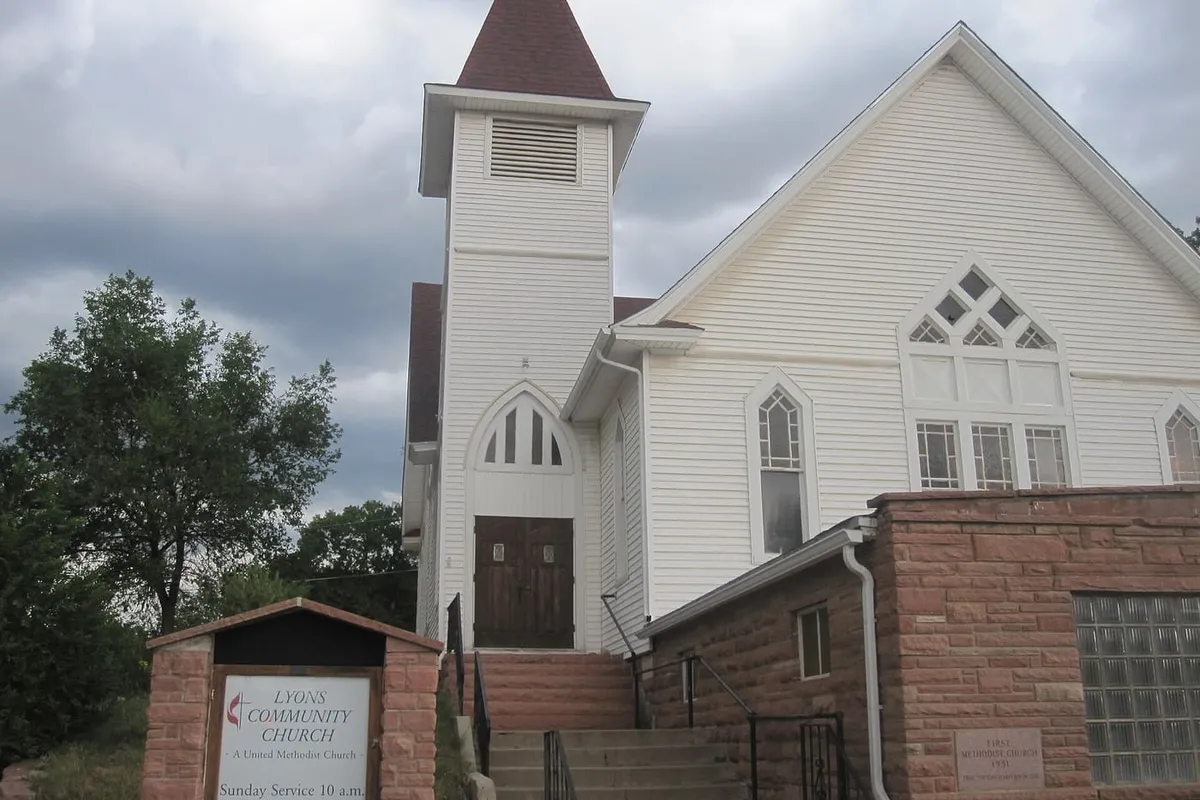 Lyons Community Church, a red sandstone church with a white steeple