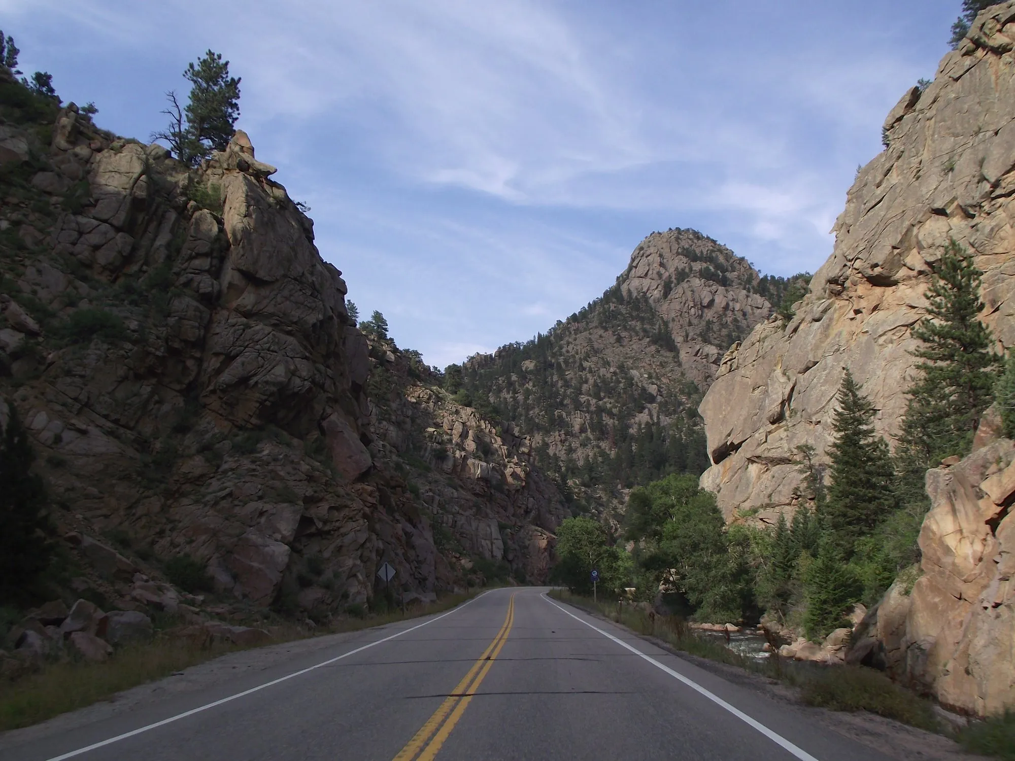 Colorado 7 winding between red sandstone walls in the South St. Vrain canyon above Lyons