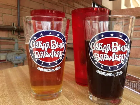 Pints of Oskar Blues beer on a table